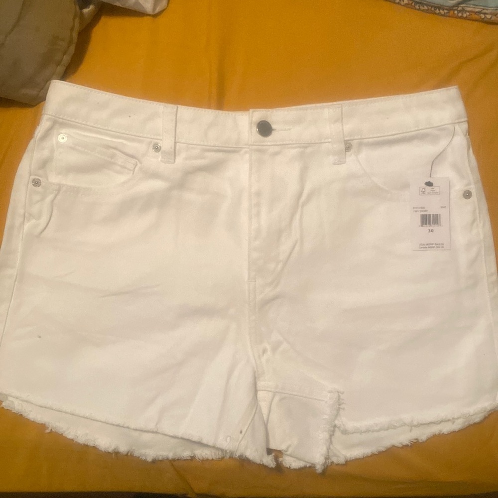 White denim volcom mid rise shorts